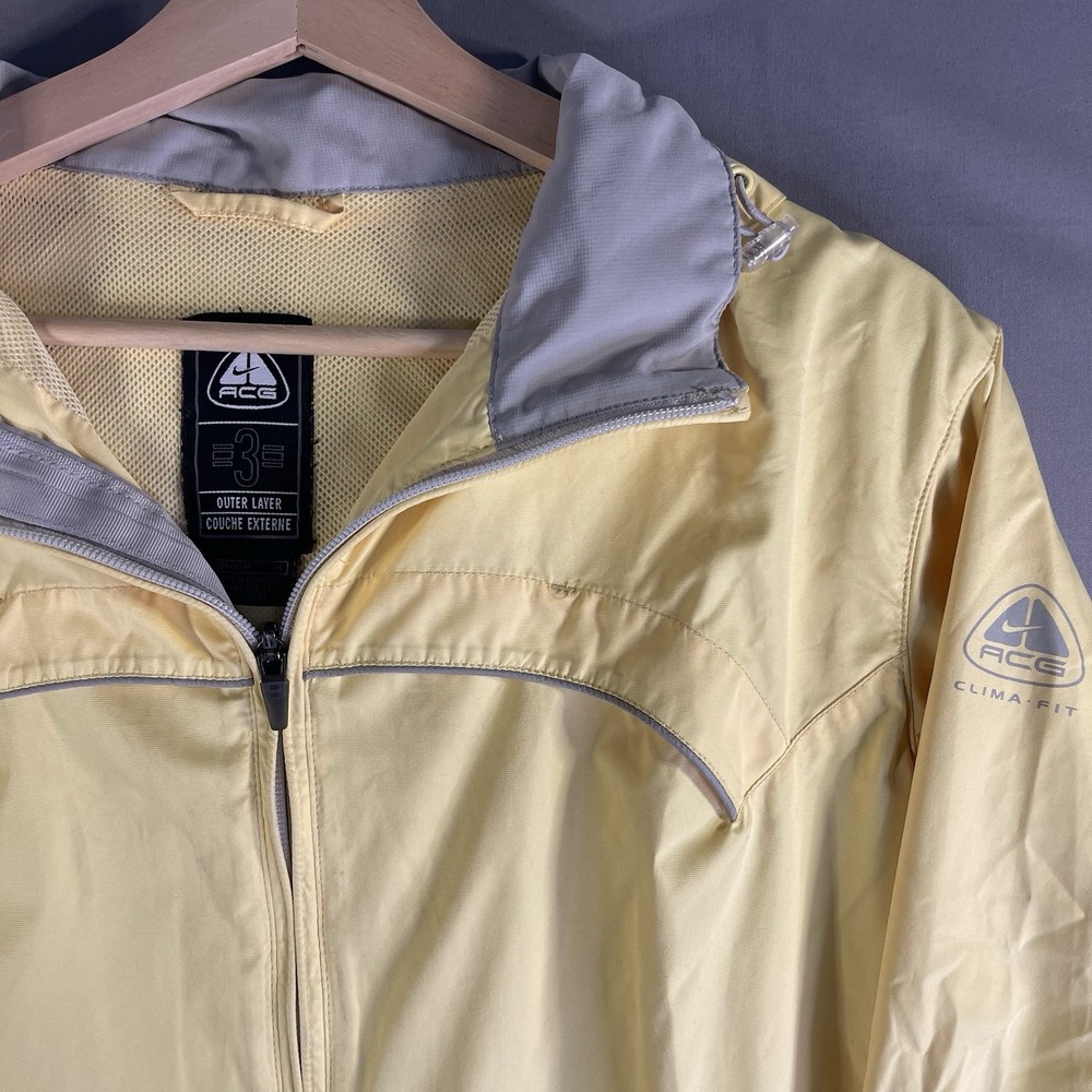 Nike ACG Outer Layer Women's Large Windbreaker Jacket with Packable Hood Yellow